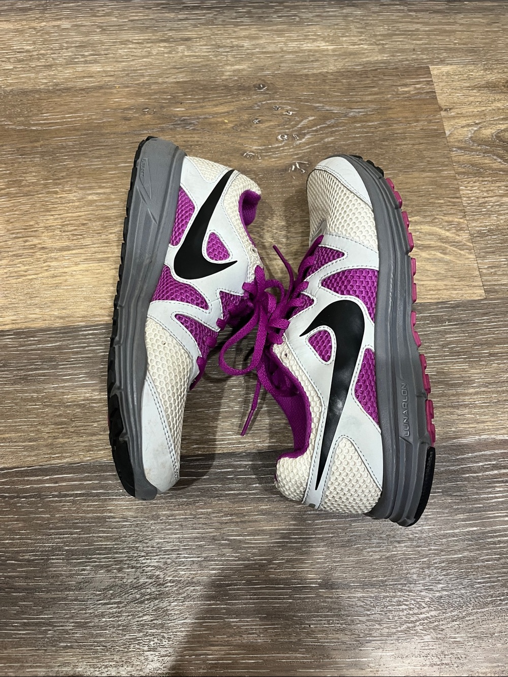 Nike Women’s White, Purple and Black Athletic Running Shoes
